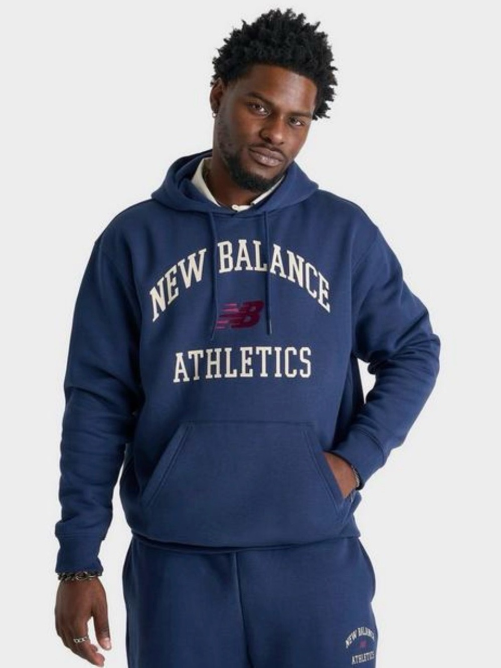 New Balance Athletics Collegiate Fleece Hoodie in navy with a crimson logo